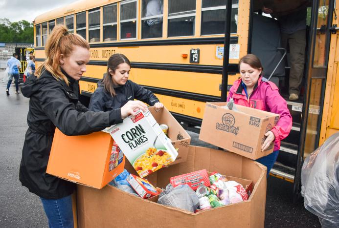 packing the school bus with donations