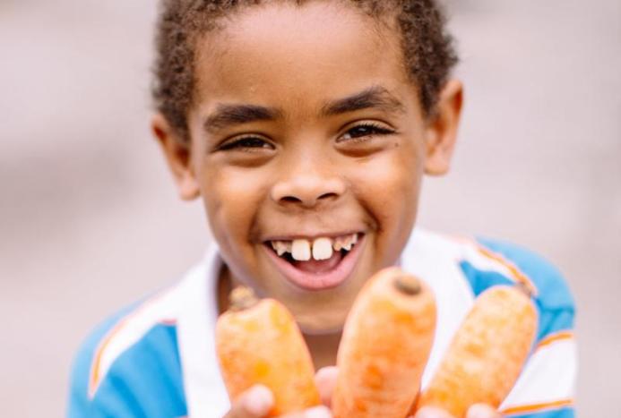 Boy with Carrots