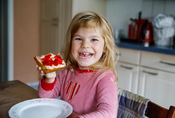 Girl eating toast