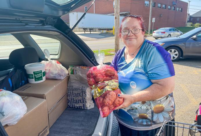 Betty receiving groceries