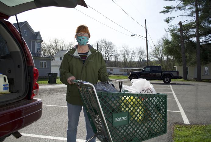 Person with cart of food