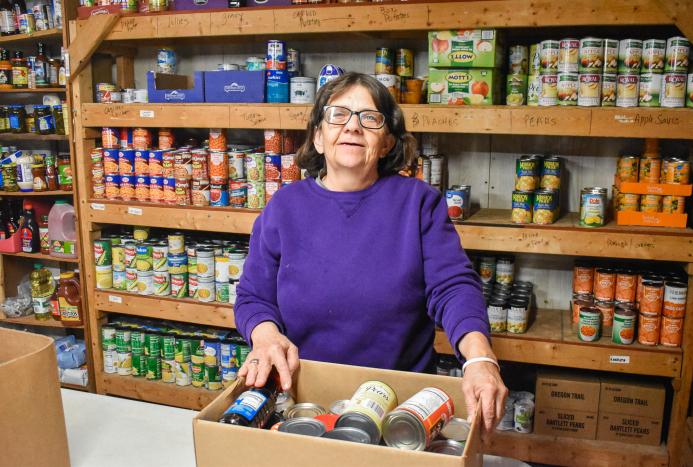 person in food pantry