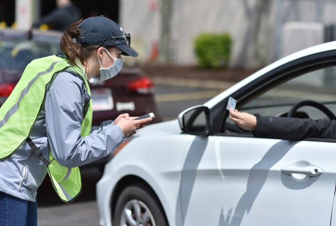 person by car