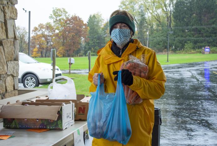 person with bag of food