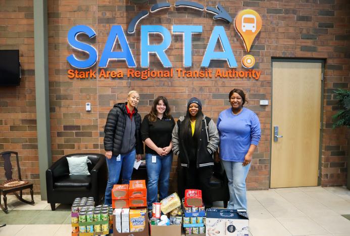 SARTA staff with food donations 