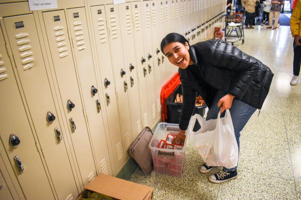 Packing boxes of food for kids