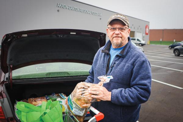 Patrick receives food from the Foodbank