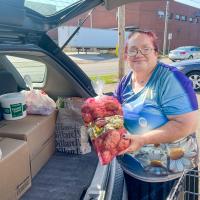 Betty receiving groceries