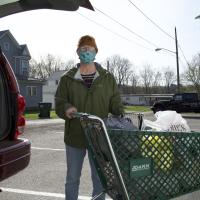 Person with cart of food