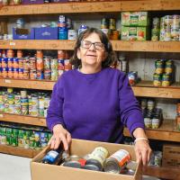 person in food pantry