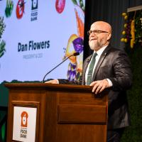 Dan Flowers speaking at the luncheon