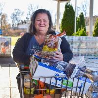 Helen, a neighbor, receives food from the Foodbank's network