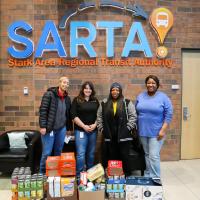 SARTA staff with food donations 